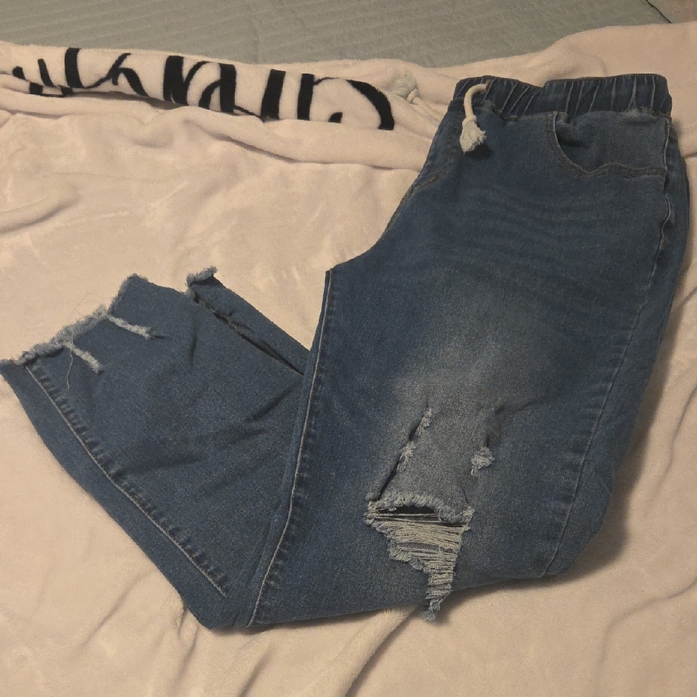 Distressed Blue Denim Jeans
